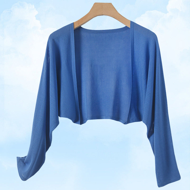 Cardigan en maille soleil pour rester au frais et au goût du jour