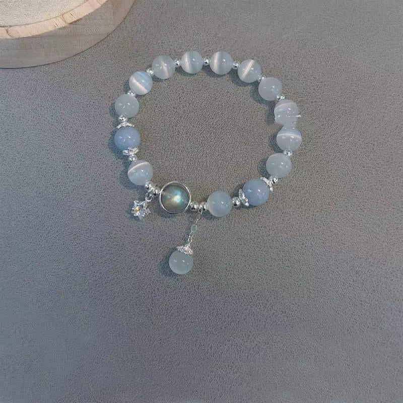 Bracelet imitation œil de chat cristal de papillon