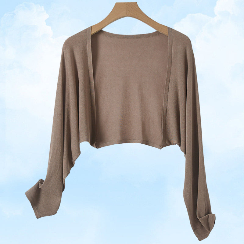 Cardigan en maille soleil pour rester au frais et au goût du jour