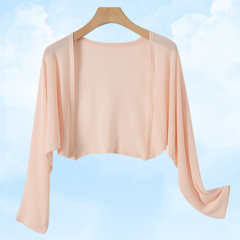 Cardigan en maille soleil pour rester au frais et au goût du jour