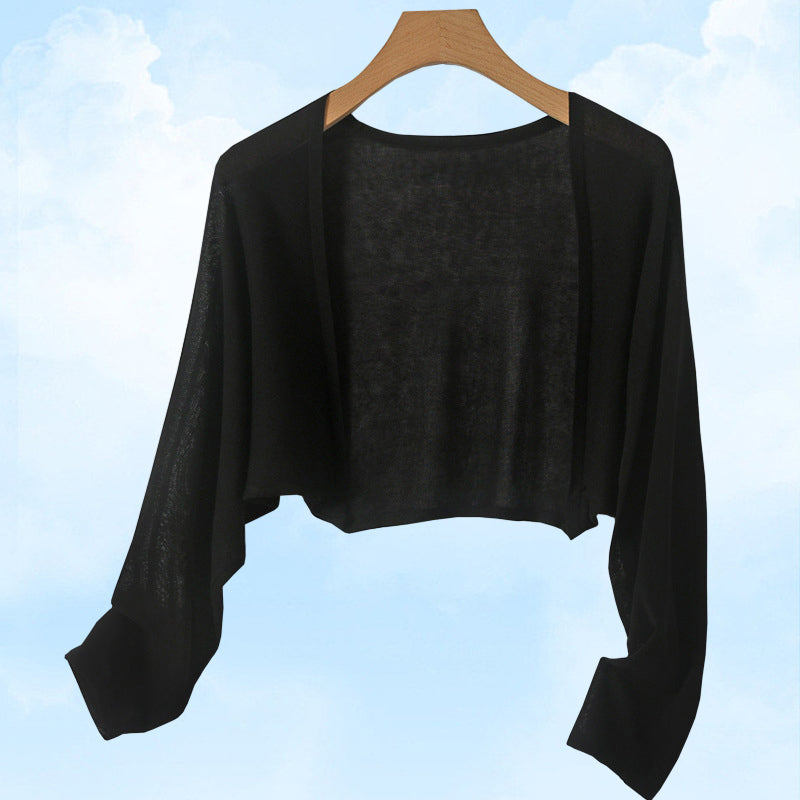 Cardigan en maille soleil pour rester au frais et au goût du jour