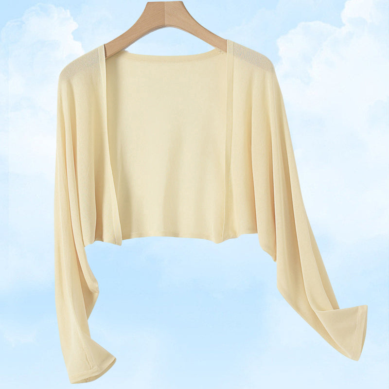 Cardigan en maille soleil pour rester au frais et au goût du jour