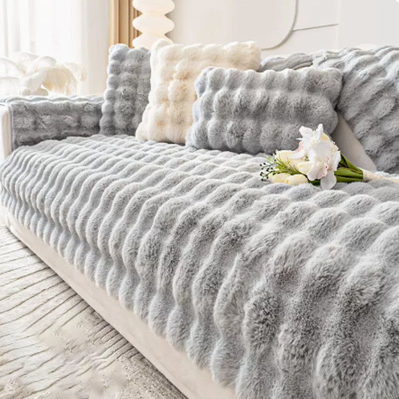 Housse de canapé antidérapante en peluche de couleur unie