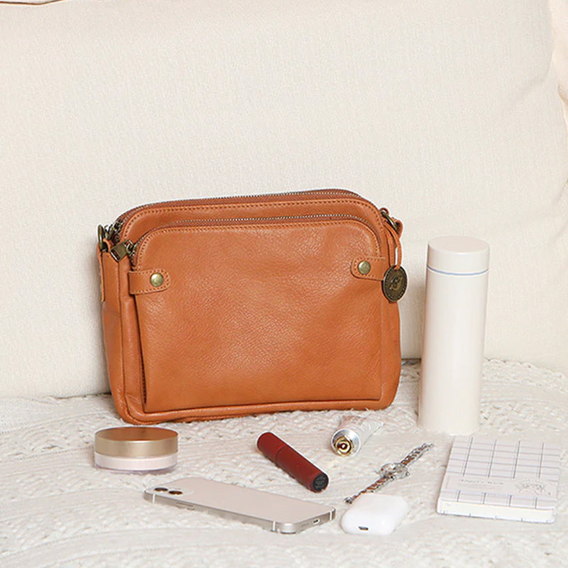 Sac à bandoulière et pochette en cuir à trois couches