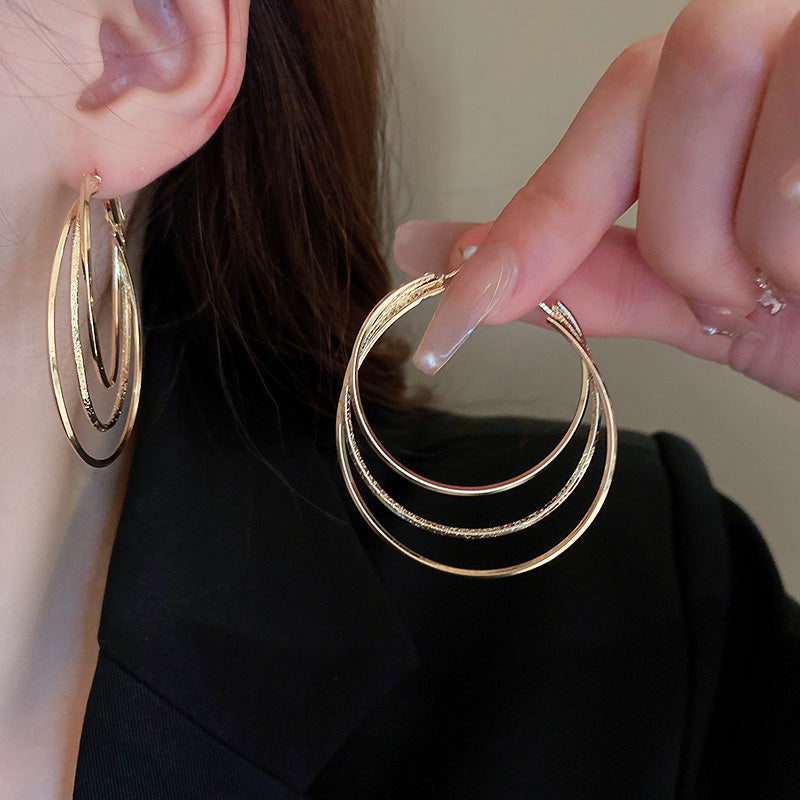 Boucles d'oreilles créoles multicouches