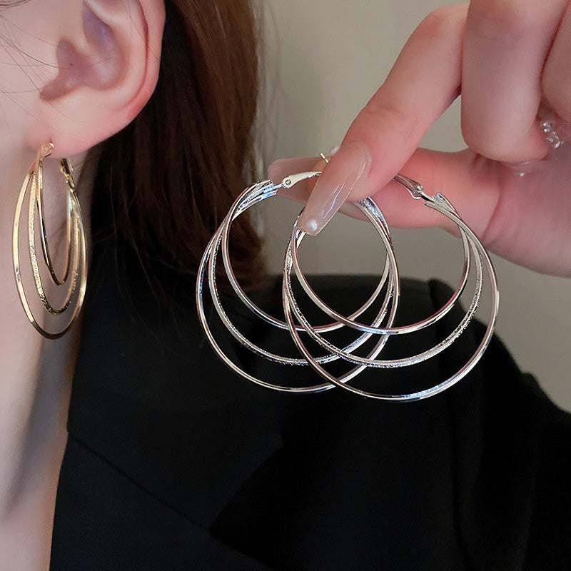 Boucles d'oreilles créoles multicouches