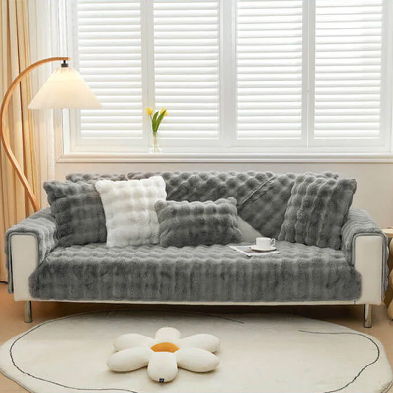 Housse de canapé antidérapante en peluche de couleur unie