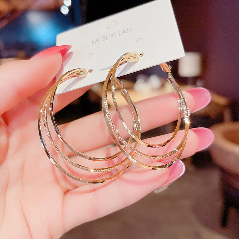 Boucles d'oreilles créoles multicouches
