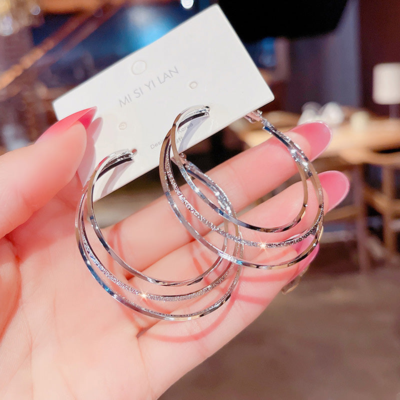 Boucles d'oreilles créoles multicouches