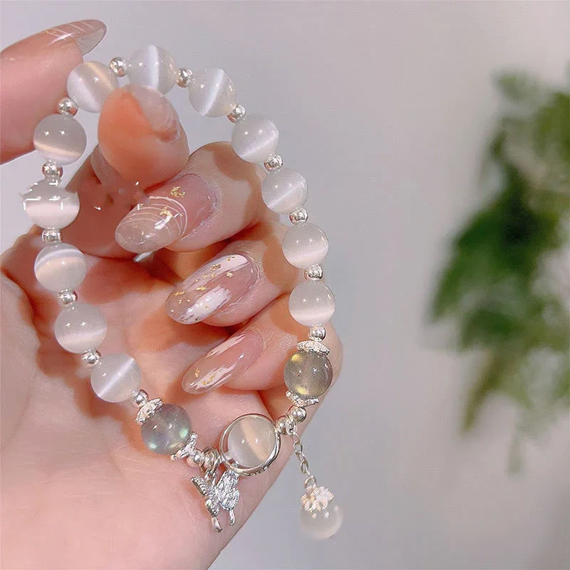 Bracelet imitation œil de chat cristal de papillon