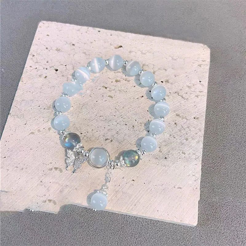 Bracelet imitation œil de chat cristal de papillon