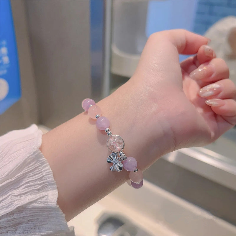 Bracelet imitation œil de chat cristal de papillon