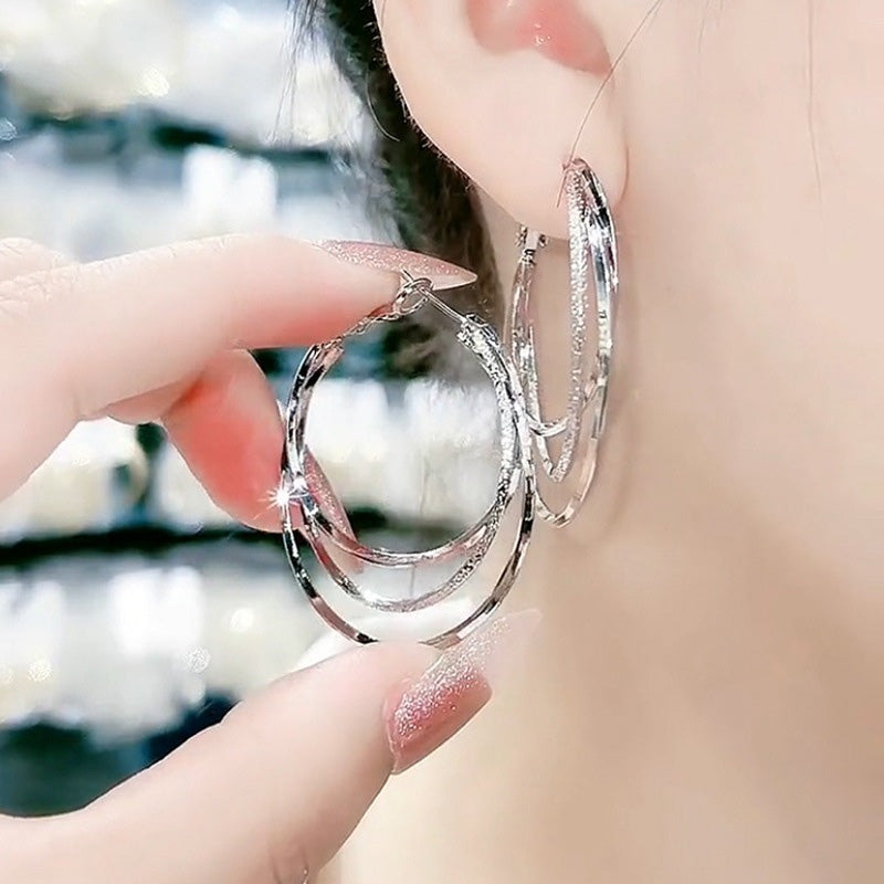 Boucles d'oreilles créoles multicouches