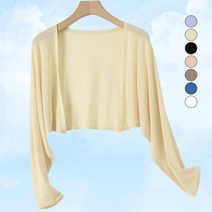 Cardigan en maille soleil pour rester au frais et au goût du jour