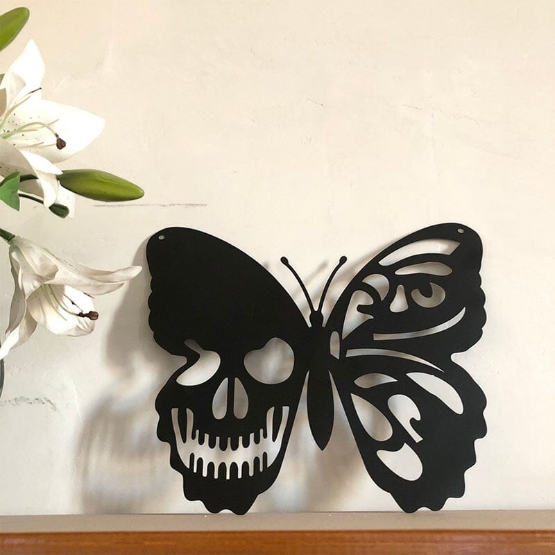 Décoration murale papillon tête de mort en métal