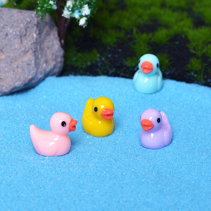 Petits canards en résine