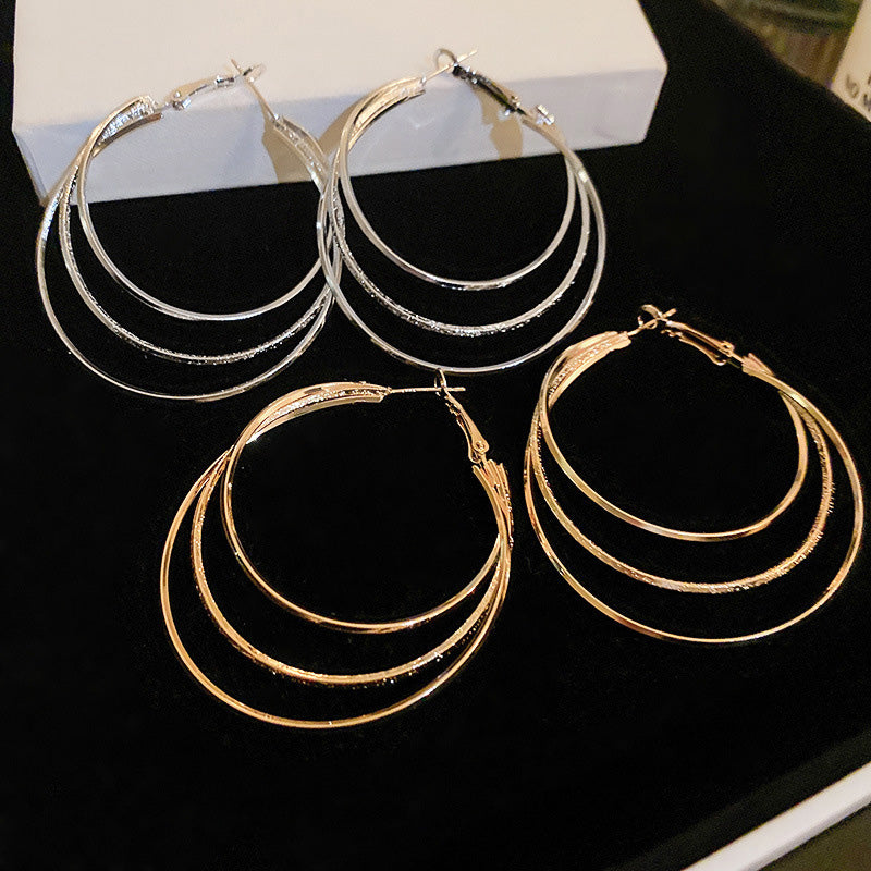 Boucles d'oreilles créoles multicouches
