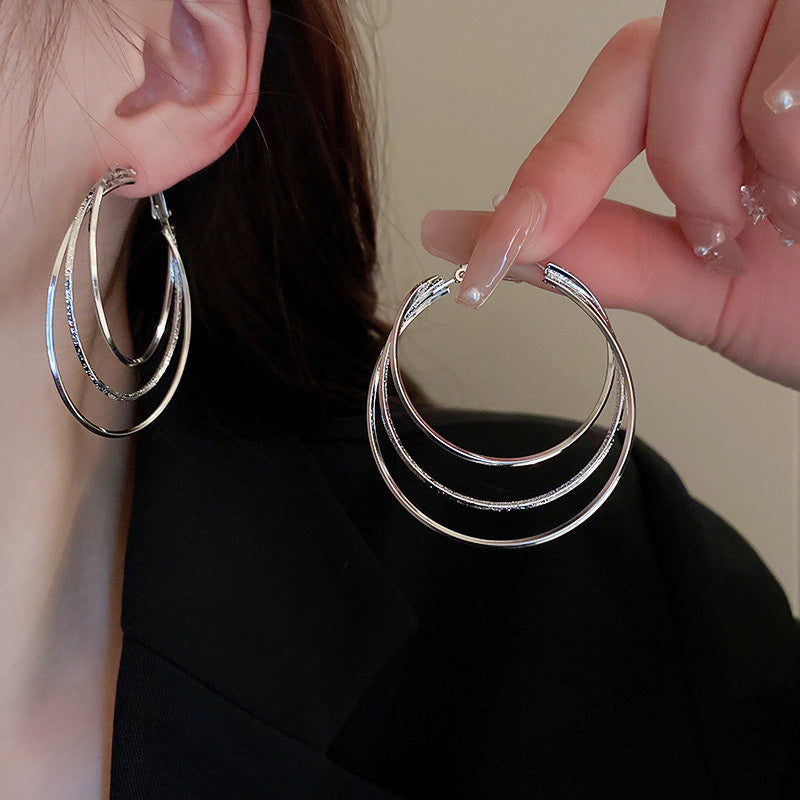 Boucles d'oreilles créoles multicouches